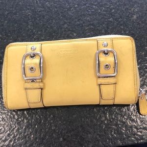 Yellow leather Coach wallet